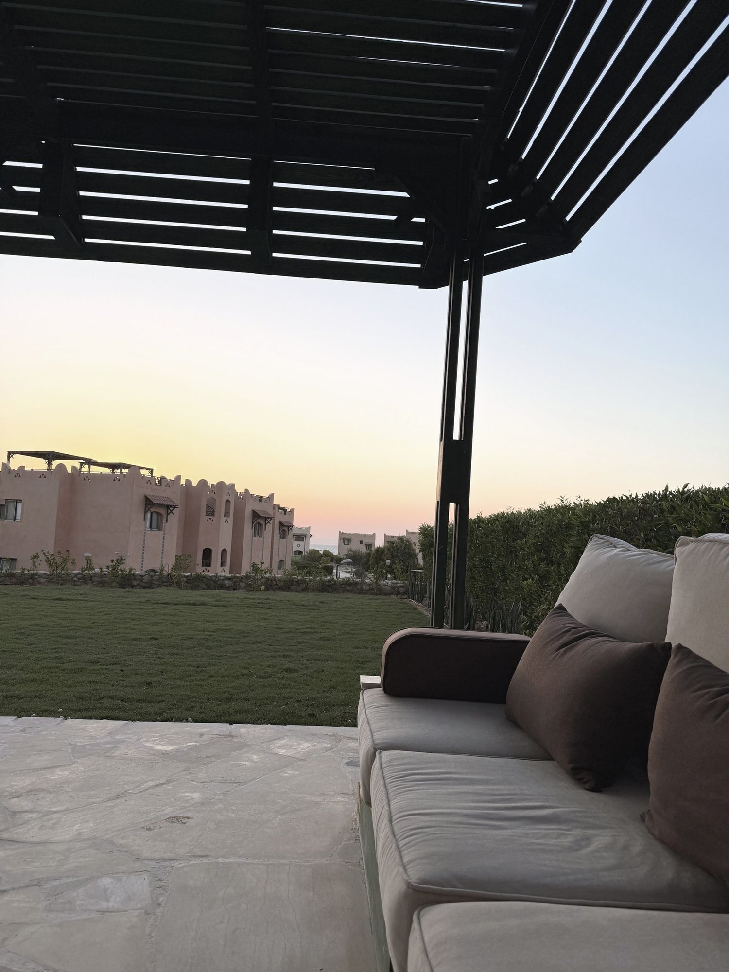 The garden after sunset from the outdoor seating